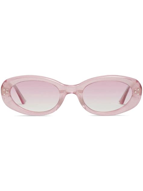 Oval frame sunglasses in transparent grey 